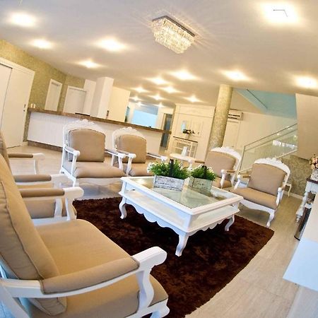 Hotel Oma Zita Forquilhinha Bagian luar foto